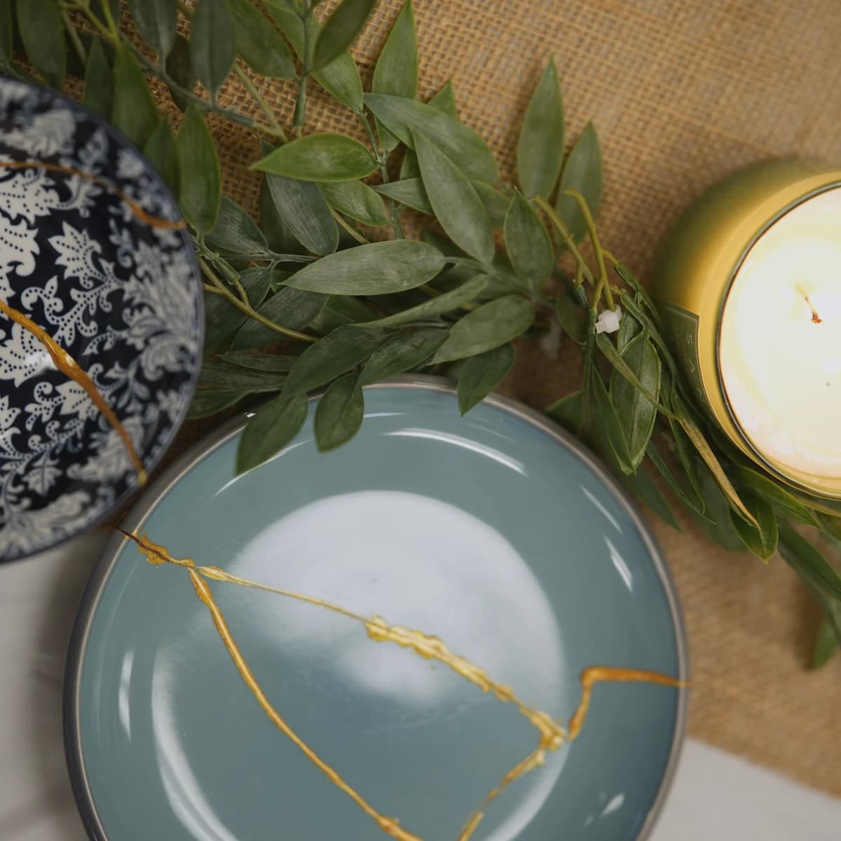 A ceramic bowl repaired with a fine gold seam